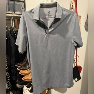Champion large golf shirt. Light gray with blue trim near buttons